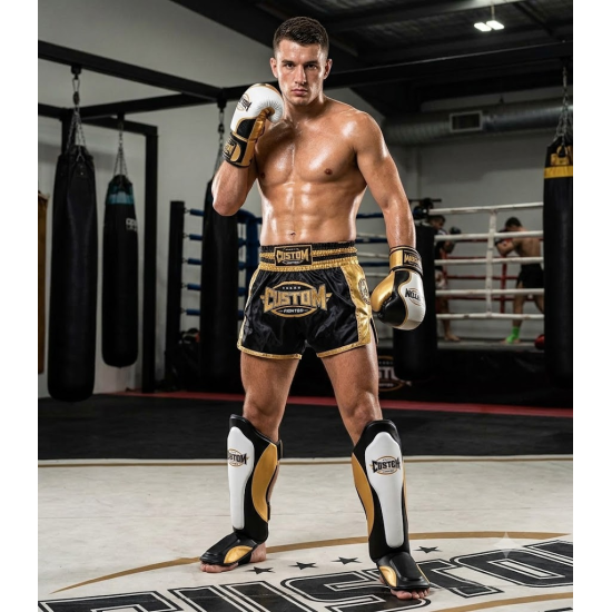 Espinilleras Custom Fighter para deportes de contacto "Bicolor dorado"