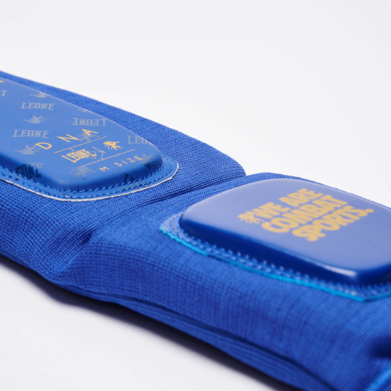 Espinilleras para deportes de contacto Leone 1947 "DNA" PT123 azul
